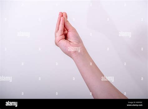 Woman gesturing typical Italian hand gesture, this gesture meaning ...