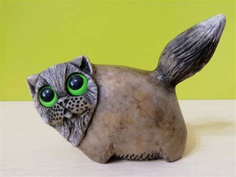 Скульптура кота из камня - 77 фото