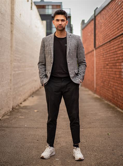 grey plaid blazer black  shirt black pants white sneakers suits