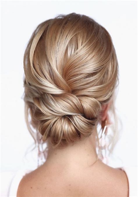 Bun updo wedding Idea | nitabeestastys
