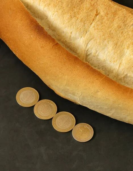 ⬇ Скачать картинки Bread costs, стоковые фото Bread costs в хорошем ...