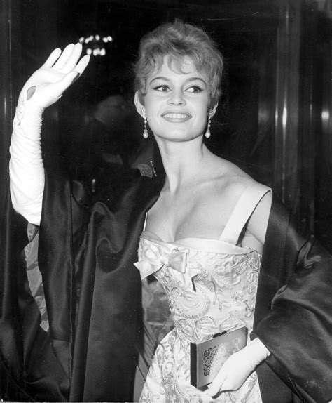 BB’s outfit from when she met Marilyn Monroe and Queen Elizabeth II is