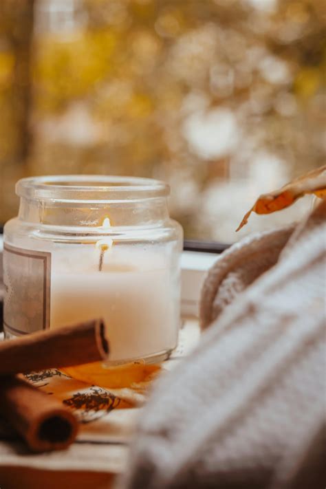 Person Holding a Lighted Candle · Free Stock Photo