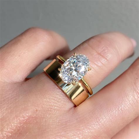 diamond engagement ring paired  beautiful yellow gold bands artofit