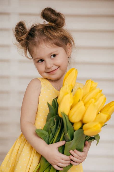 portrait  beautiful  girl  yellow dandelion  tulips
