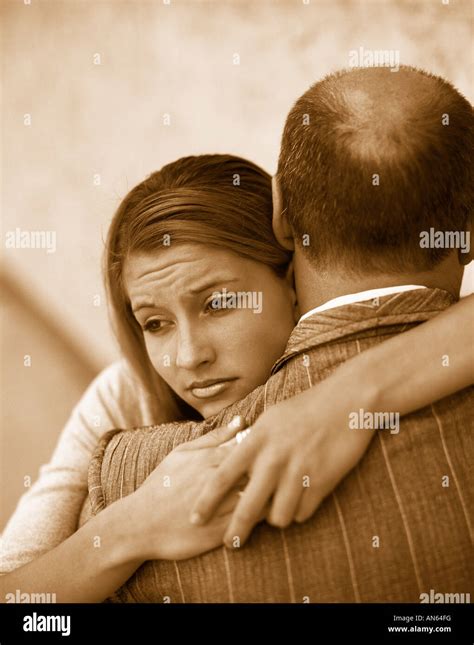 Two people hugging Stock Photo - Alamy