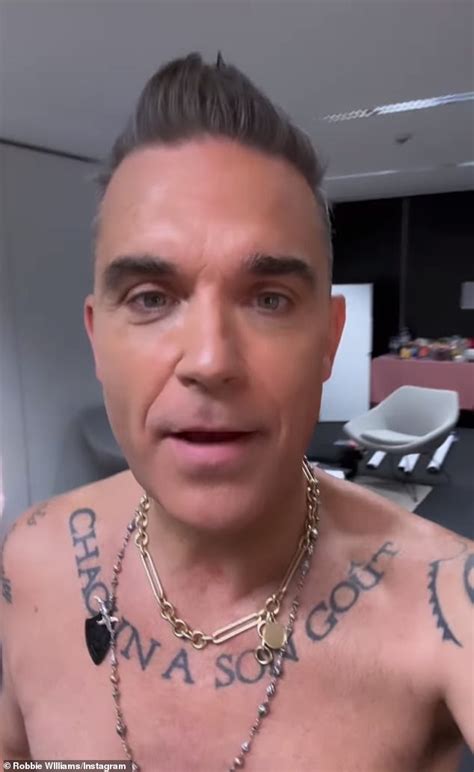 robbie williams   cheeky   strips naked  flashes
