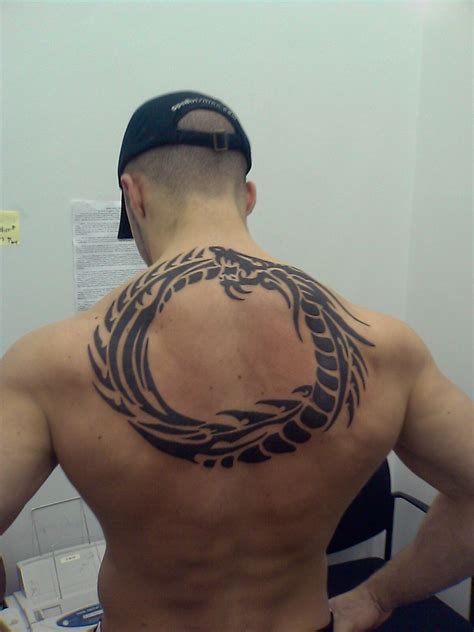 30 Amazing Tribal Tattoo Designs For Men