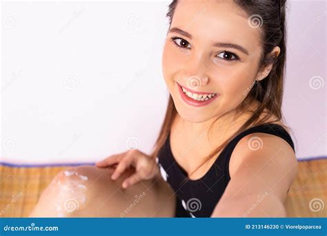 Cropped Photo of a Young Girl with a Beautiful Smile in a Swimsuit