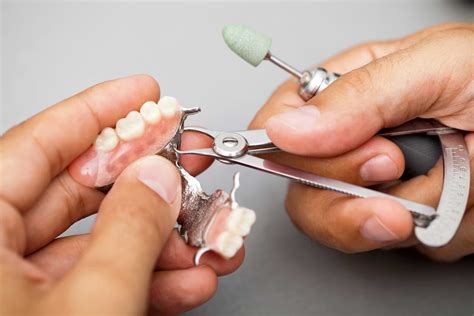 how to take care of false teeth