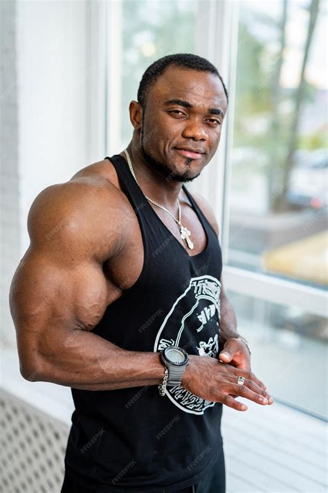 Premium Photo | Handsome muscular man posing on camera with perfect