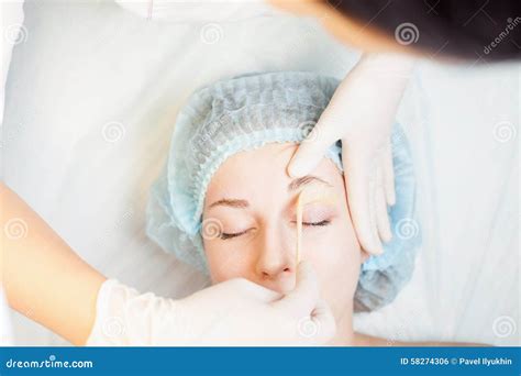 Professional Woman at Spa Beauty Salon Doing Epilation Stock Photo ...