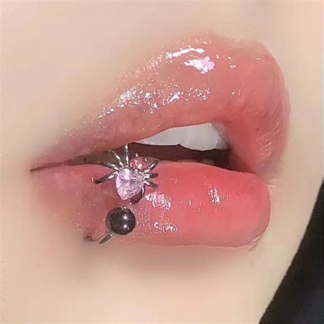 Spider Bite Tongue Piercing