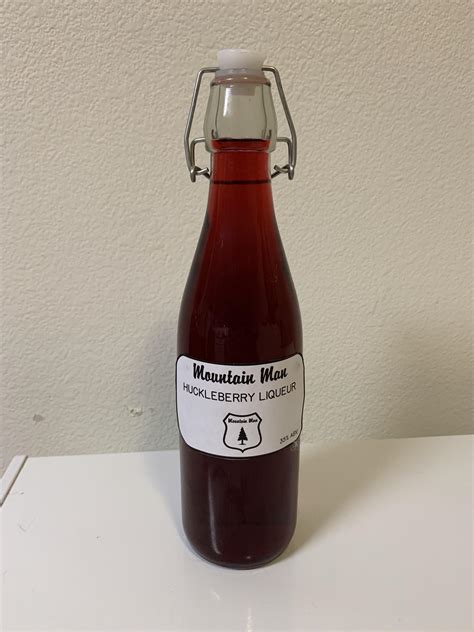 A bottle from my yearly batch of huckleberry liqueur : r/cocktails
