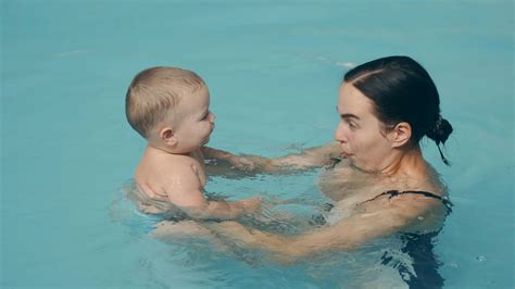 adult  baby   pool  stock video