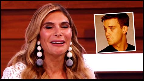 What's happened to Robbie Williams' face? The singer looks VERY ...