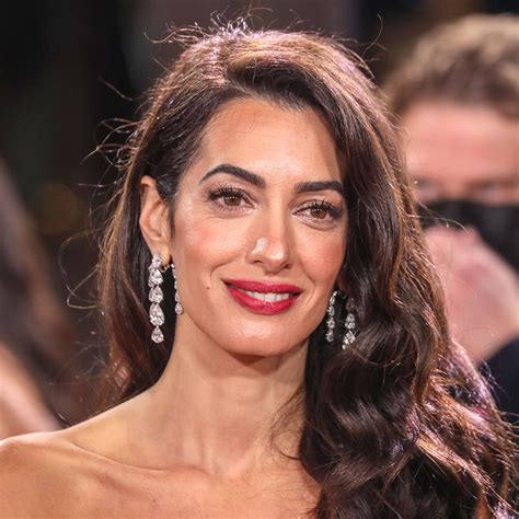 Amal Clooney Dazzles In A One-Shoulder Sequined Silver Gown