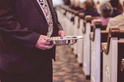 Man Passing the Offering Plate in a Traditional American Church Stock Photo - Image of saint ...