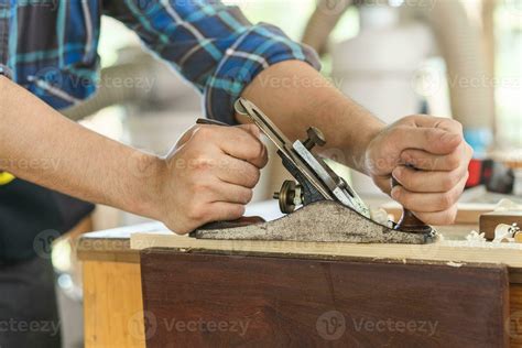 Carpentry professional, asian young man, male carpenter use machines or ...