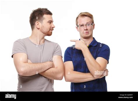 Two young men having fun talking Stock Photo - Alamy