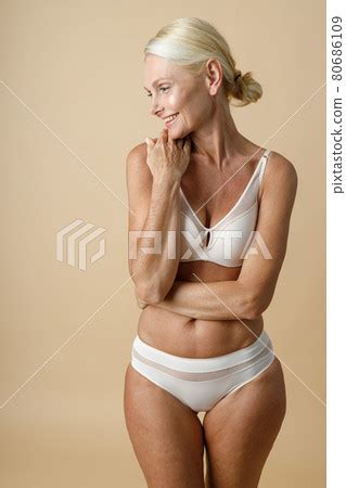 beautiful mature woman  underwear  fit stock photo