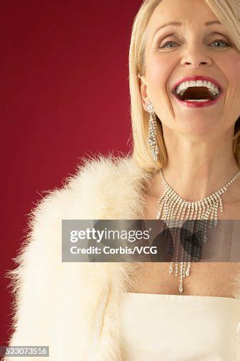 wealthy mature woman laughing high res stock photo getty images