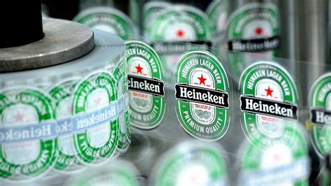 heineken profits hit  currency volatility including pound plunge