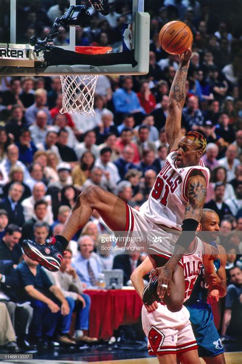 News Photo : Dennis Rodman of the Chicago Bulls grabs the... | Dennis ...