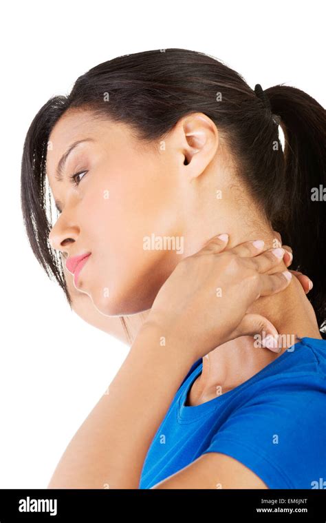 young woman holding hand   neck stock photo alamy