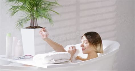 Pretty Bare Girl Taking Bathtub in Morning. Stock Footage - Video of