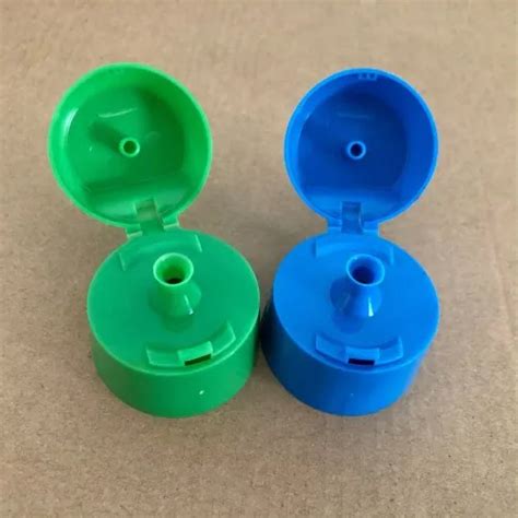 Green & Blue Plastic Flip Top Cap at Best Price in Ghaziabad | Dewan ...