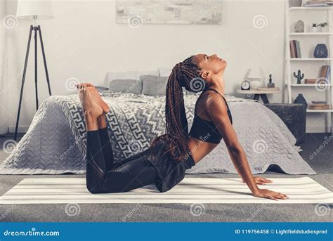 Attractive African American Woman Practicing Yoga Stock Photo - Image ...
