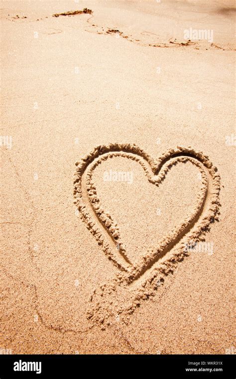 Heart Sand Beach Stock Photo - Alamy