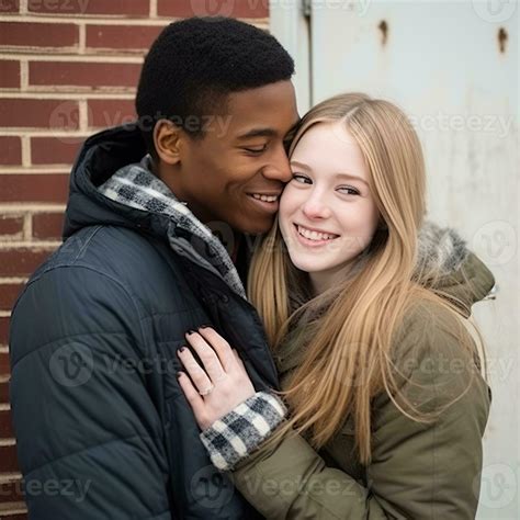 Loving teenage interracial couple is enjoying a romantic winter day AI