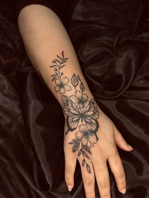 Lower arm and hand tattoos for women | Skeleton hand tattoos women with ...