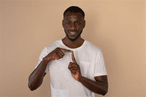 deaf man  american sign language   canva