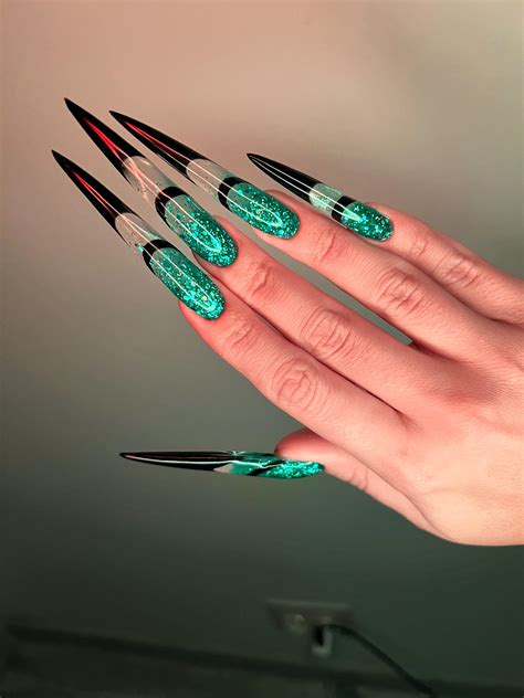 My new extra long sharp green stiletto nails 💚🖤 : r/Nails