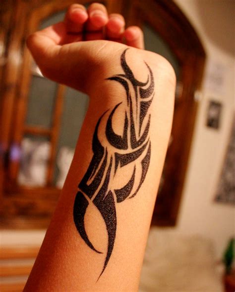 39 Awesome Tribal Wrist Tattoo Designs - Wrist Tattoo Pictures