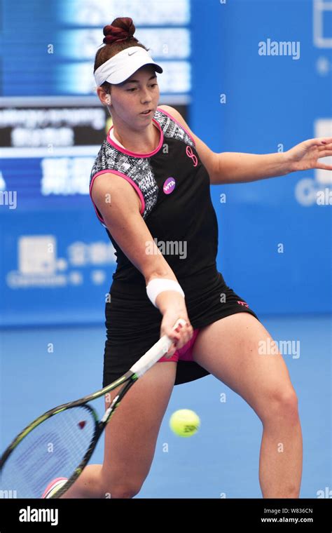 Nina Stojanovic of Serbia returns a shot to Katerina Siniakova of Czech ...