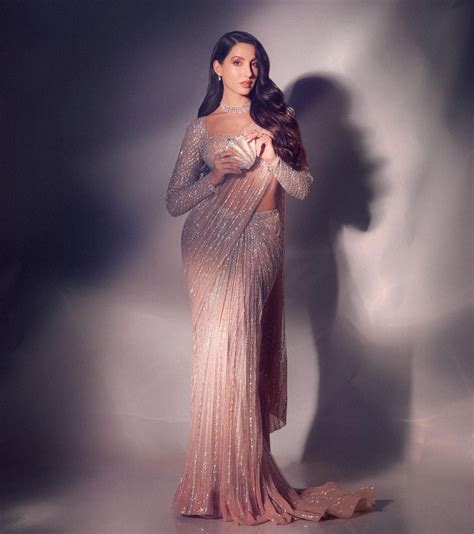 nora fatehi  festival ready  sparkling silver saree check