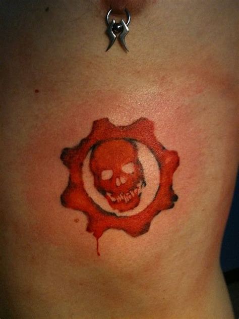 Keith Groves Gears of War cog tattoo Artistic Ink | War tattoo, Tattoos, Maple leaf tattoo