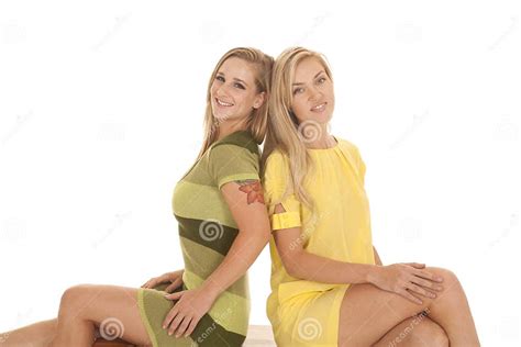 Two Women Green Yellow Sit Smile Stock Image - Image of beautiful ...