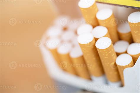 peel it off Cigarette pack prepare smoking a cigarette. Packing line up ...