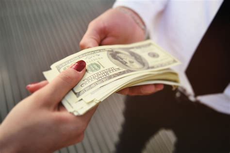 Premium Photo | Hands of people close-up bribing