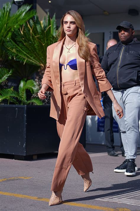 delevingnes blue bra tan suit  planet sex
