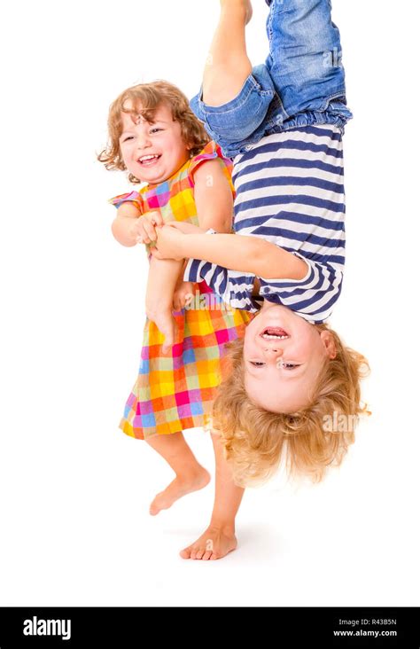 Happy kids playing together Stock Photo - Alamy