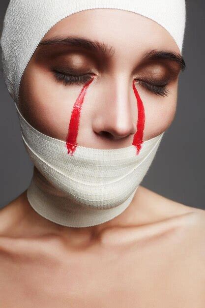 Premium Photo | Halloween cardwoman with bloody tears