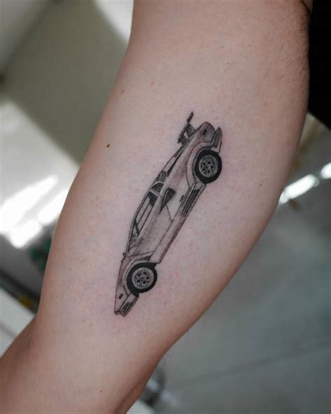 Lamborghini tattoo located on the inner arm.