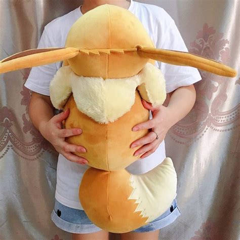 Pokemon Eevee Pillow | Sleeping Stuffed Eevee Pokemon - Plushie Pulse