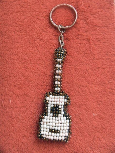 Брелки из бисера: фото инструкция и схемы для начинающих. Простой ...